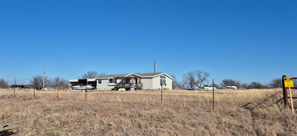 701 State Highway North Byers, TX 76357 - Photo 3 of 6 a view of a house with a yard