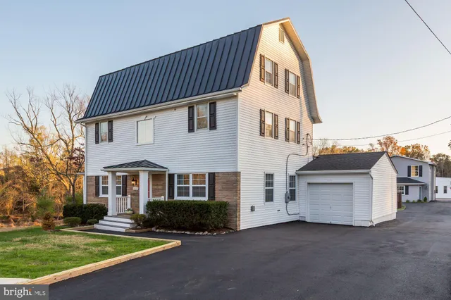 a view of storage and utility room with washer and dryer