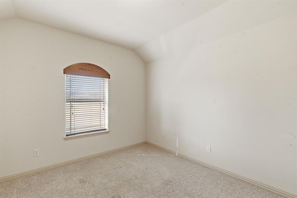 119 Cooperstown Drive Springtown, TX 76082 - Photo 19 of 33 a view of an empty room with a window