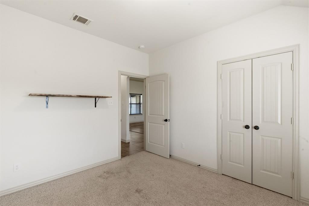 119 Cooperstown Drive Springtown, TX 76082 - Photo 20 of 33 a view of room with closet area