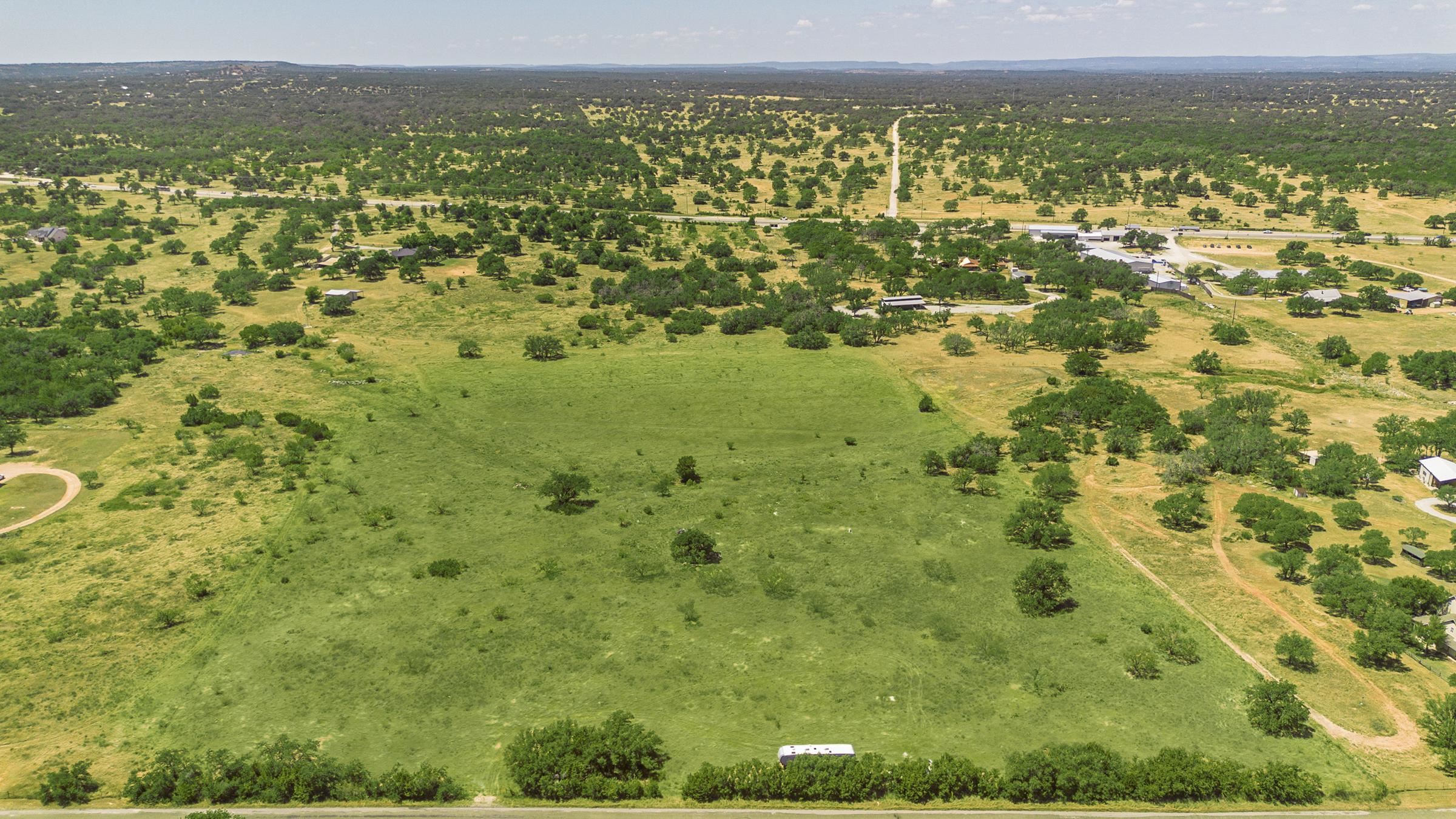 2965 Old Marble Falls Road Round Mountain, TX 78663 - Photo 2 of 28 a view of an outdoor space with mountain view
