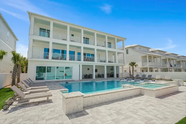 a large building with a yard in front of it