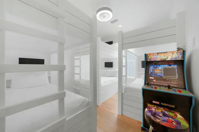 a bedroom with furniture and a window