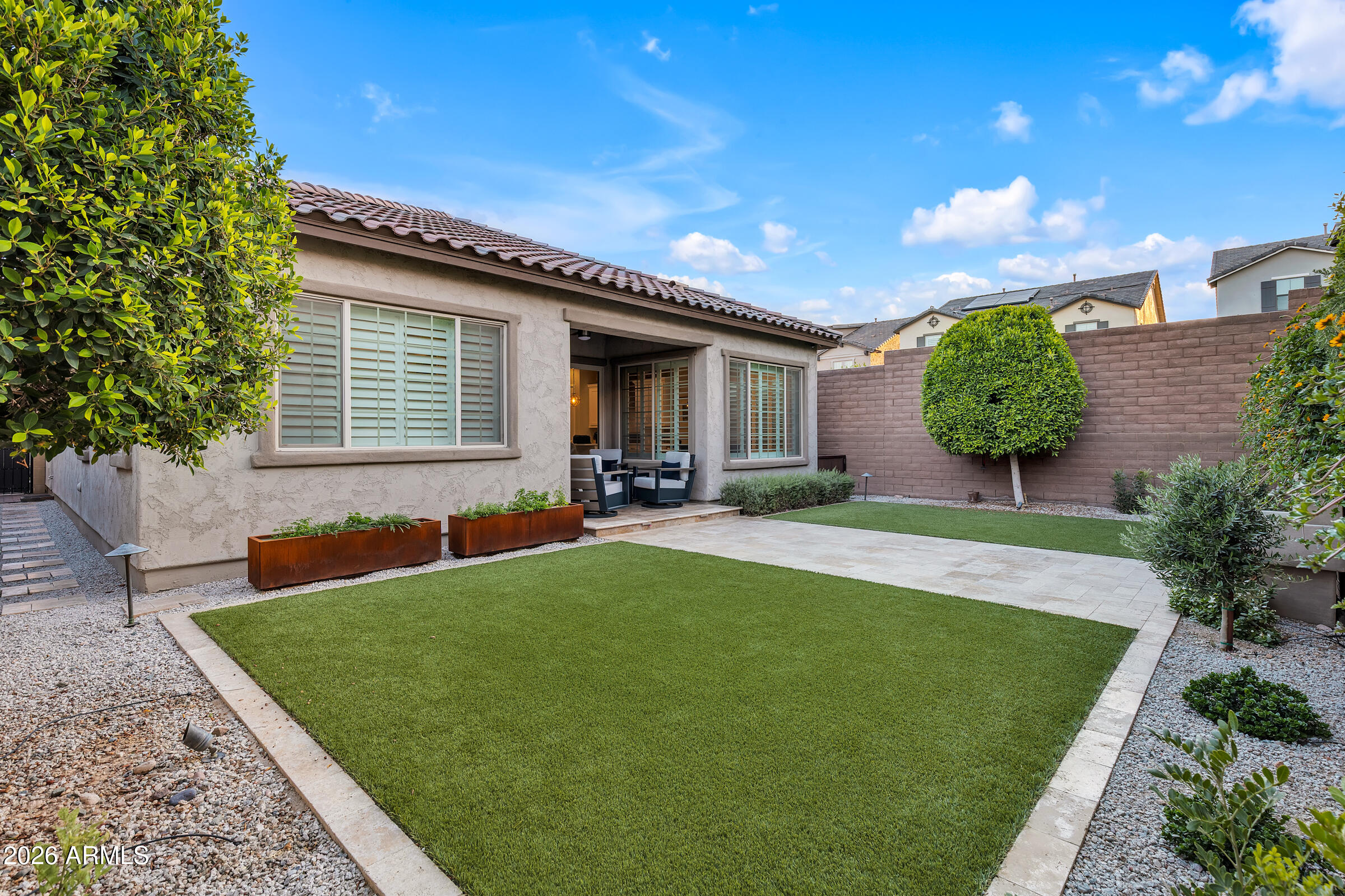622 West Deer Creek Road Phoenix, AZ 85048 - Photo 30 of 39 a view of a house with a backyard