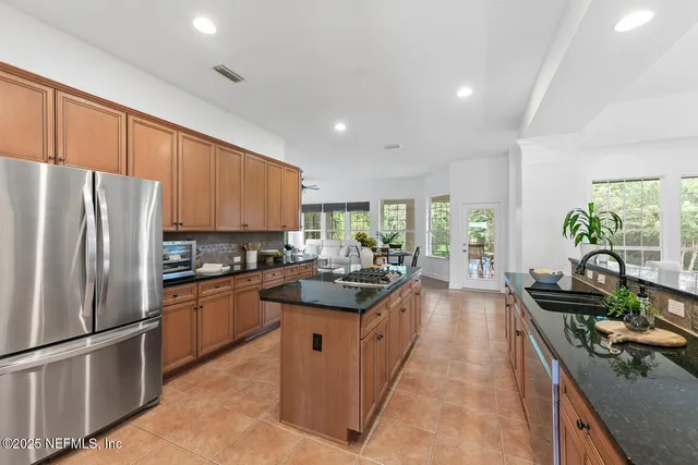a living room with furniture and a table
