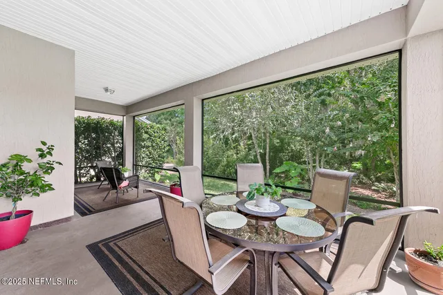 a view of an outdoor space and tennis court