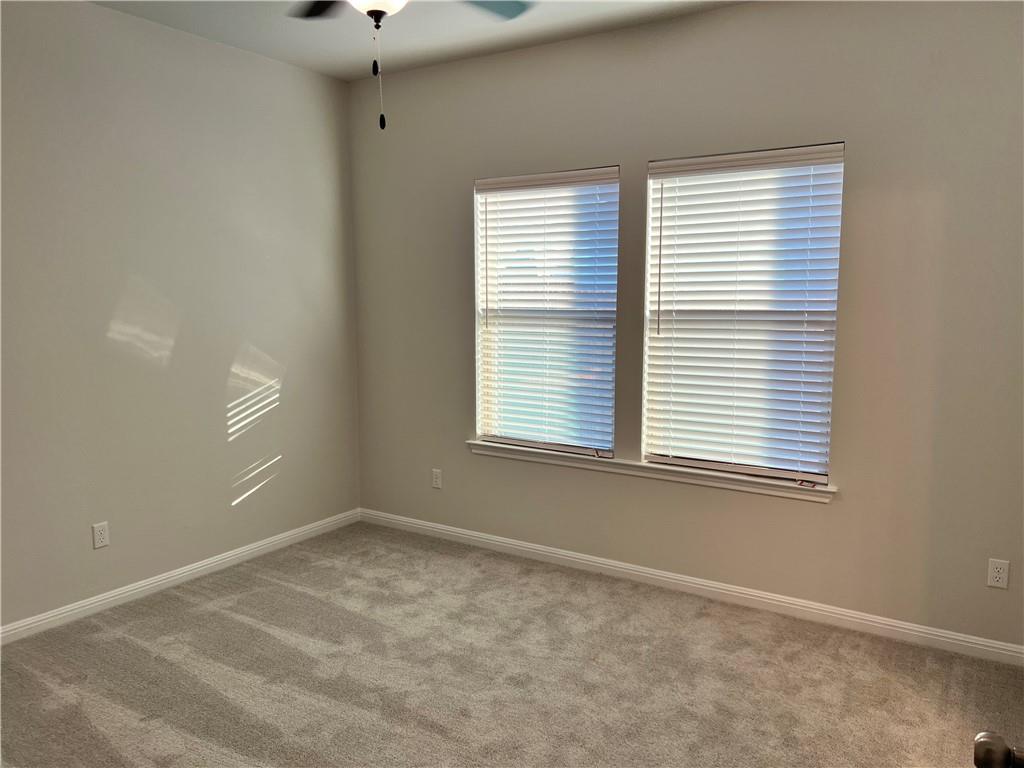 221 Arabian Colt Drive Georgetown, TX 78626 - Photo 16 of 36 a view of an empty room with a window