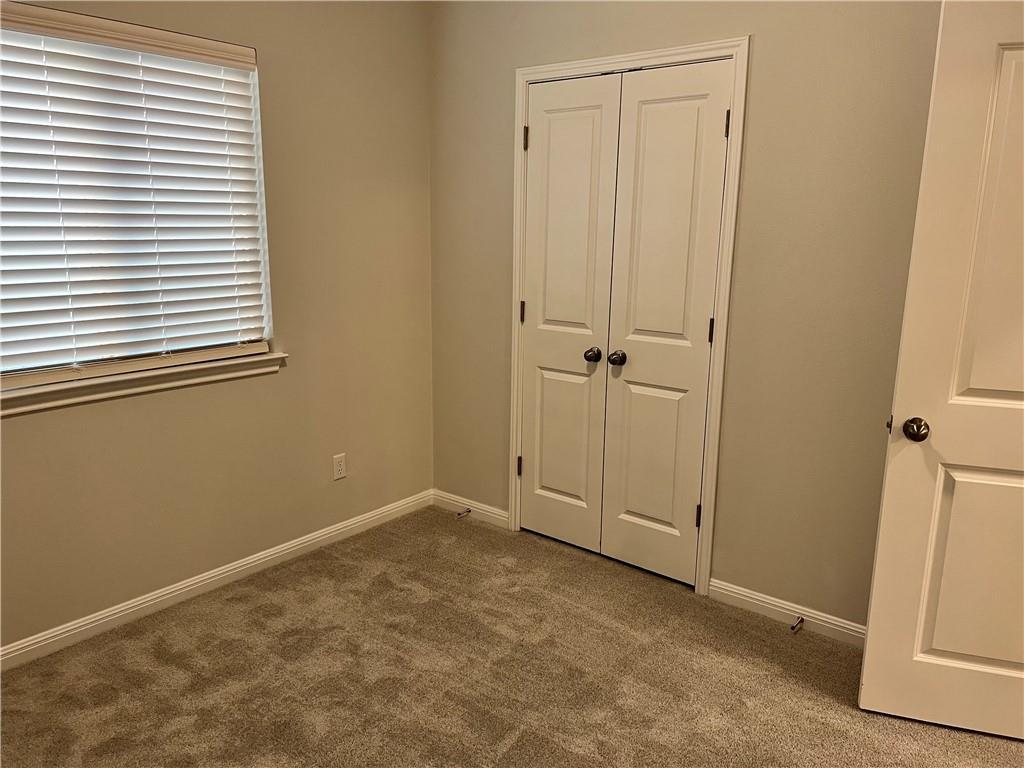 221 Arabian Colt Drive Georgetown, TX 78626 - Photo 24 of 36 a view of an empty room with a window