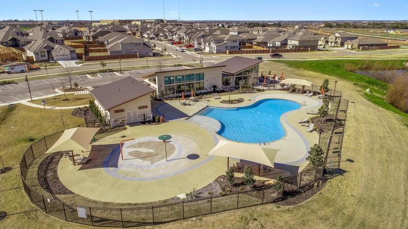 221 Arabian Colt Drive Georgetown, TX 78626 - Photo 31 of 36 a view of a swimming pool with outdoor seating