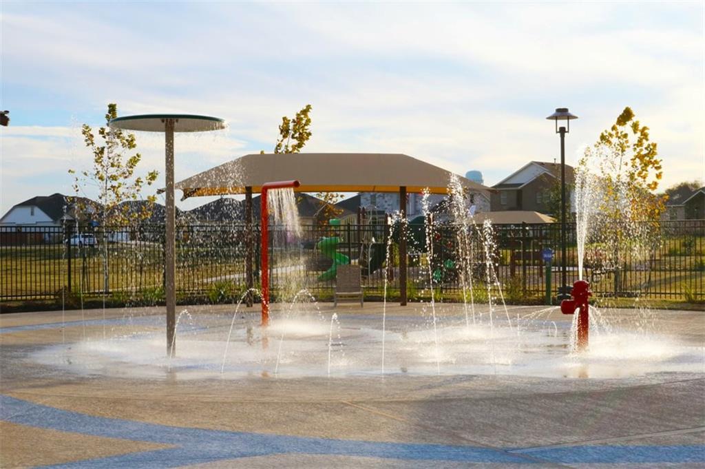 221 Arabian Colt Drive Georgetown, TX 78626 - Photo 34 of 36 a view of a street with a building