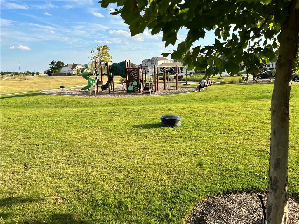 221 Arabian Colt Drive Georgetown, TX 78626 - Photo 36 of 36 a view of a yard with an outdoor space