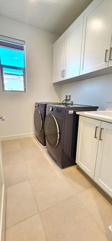 a close view of a refrigerator a washer and dryer