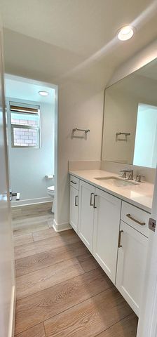 a view of a kitchen with cabinets