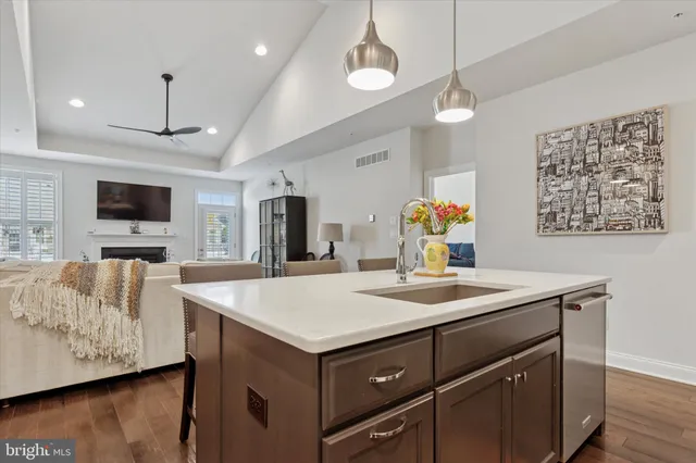 a view of kitchen island and living room