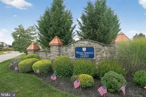 a front view of a house with yard