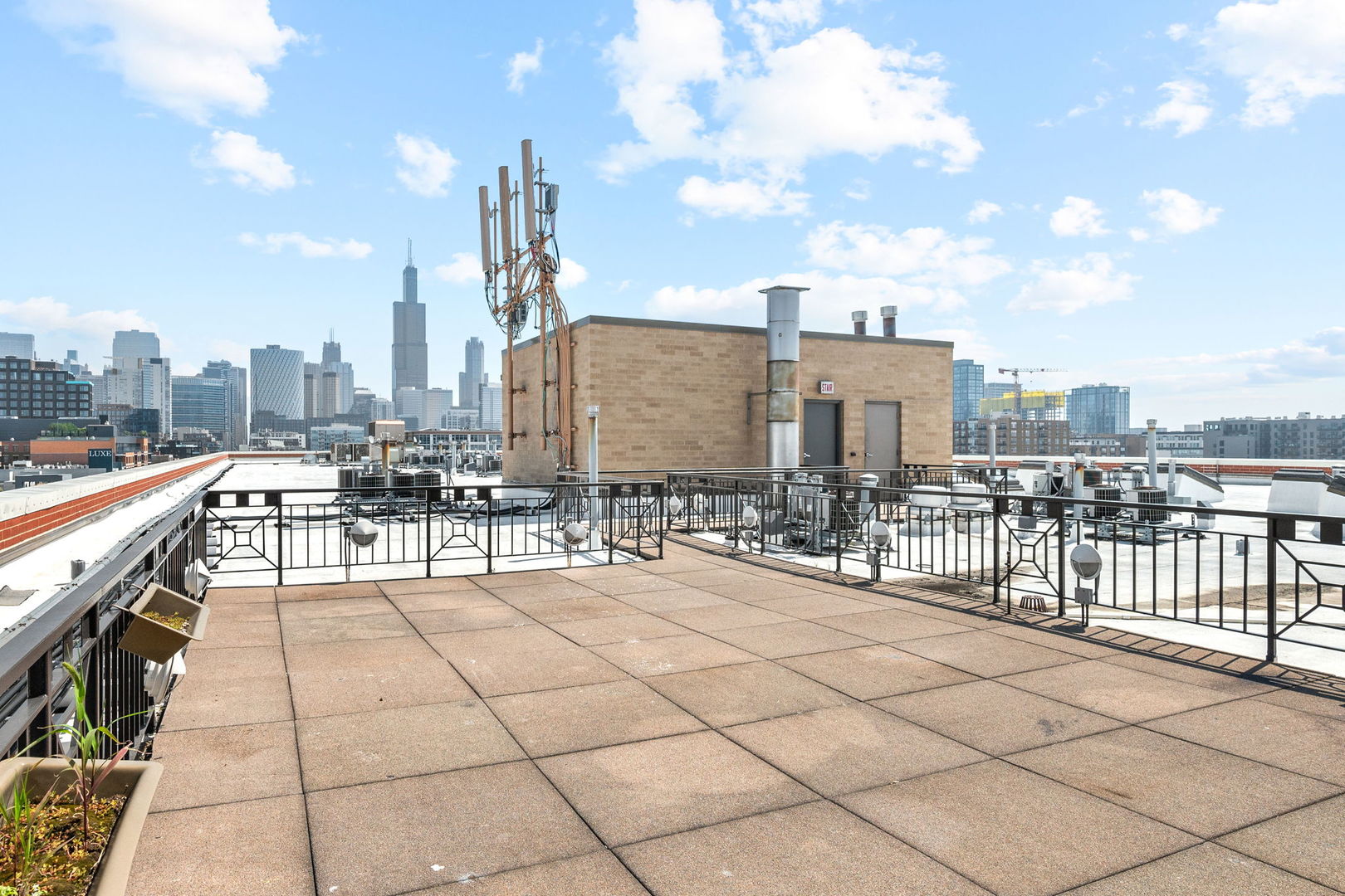 1301 West Madison Street, Unit 207 Chicago, IL 60607 - Photo 16 of 17 a view of a terrace with chairs
