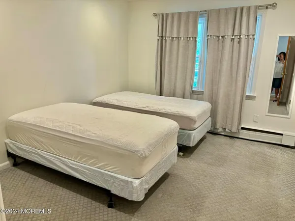 a living room with a couch and a flat screen tv