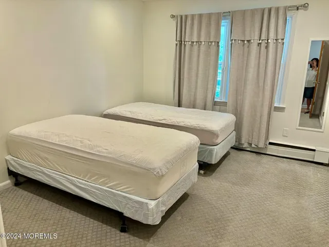 a living room with a couch and a flat screen tv