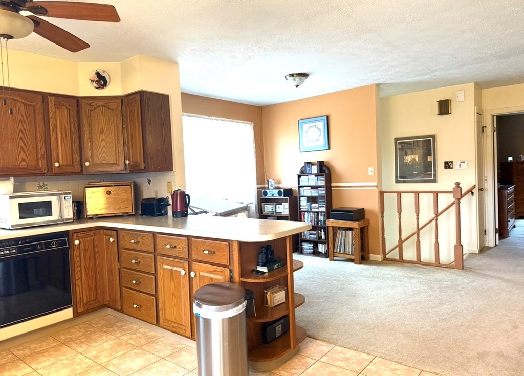 879 Kahle Road Summerville, PA 15864 - Photo 15 of 38 a kitchen with stainless steel appliances granite countertop a sink and cabinets