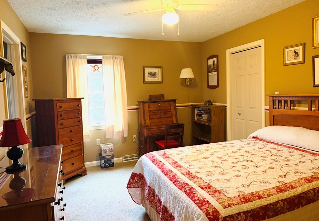 879 Kahle Road Summerville, PA 15864 - Photo 17 of 38 a bed room with a bed and dresser