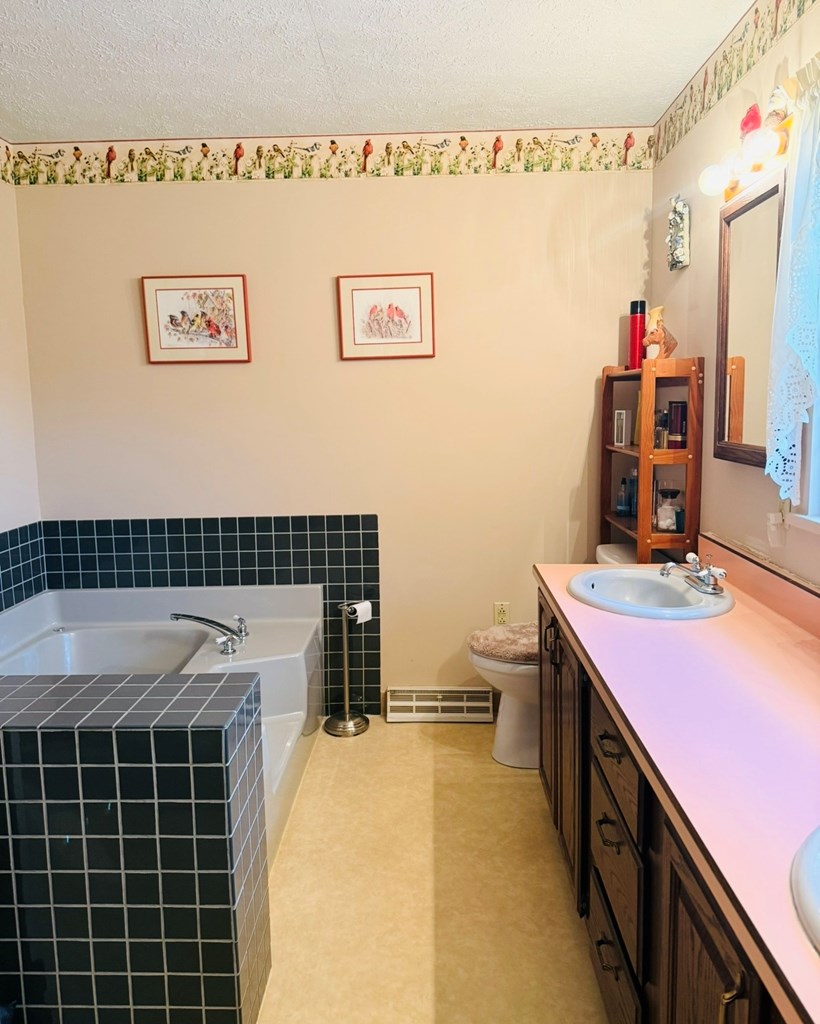 879 Kahle Road Summerville, PA 15864 - Photo 18 of 38 a bathroom with a sink and a mirror