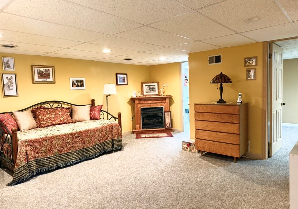 879 Kahle Road Summerville, PA 15864 - Photo 22 of 38 a bedroom with a bed and a couch