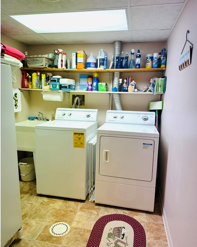 879 Kahle Road Summerville, PA 15864 - Photo 28 of 38 a utility room with dryer and washer