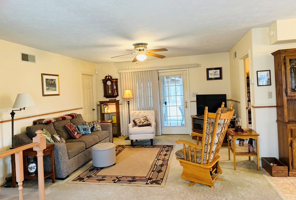 879 Kahle Road Summerville, PA 15864 - Photo 8 of 38 a living room with furniture and a fireplace