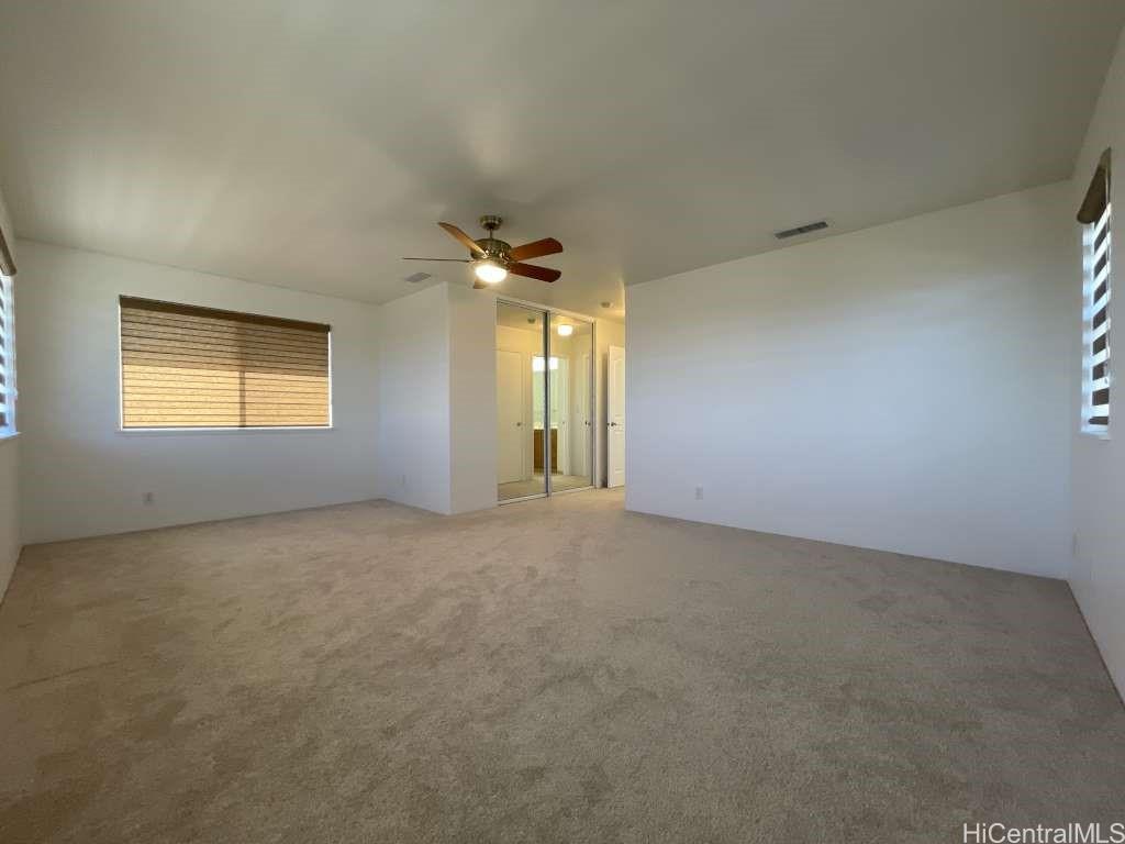94-1027 Halekapio Street Waipahu, HI 96797 - Photo 10 of 13 a view of an empty room with a window