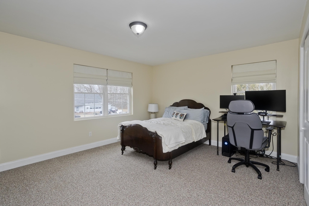48 Mountain Avenue West Springfield, MA 01089 - Photo 9 of 39 a bedroom with a bed and a window