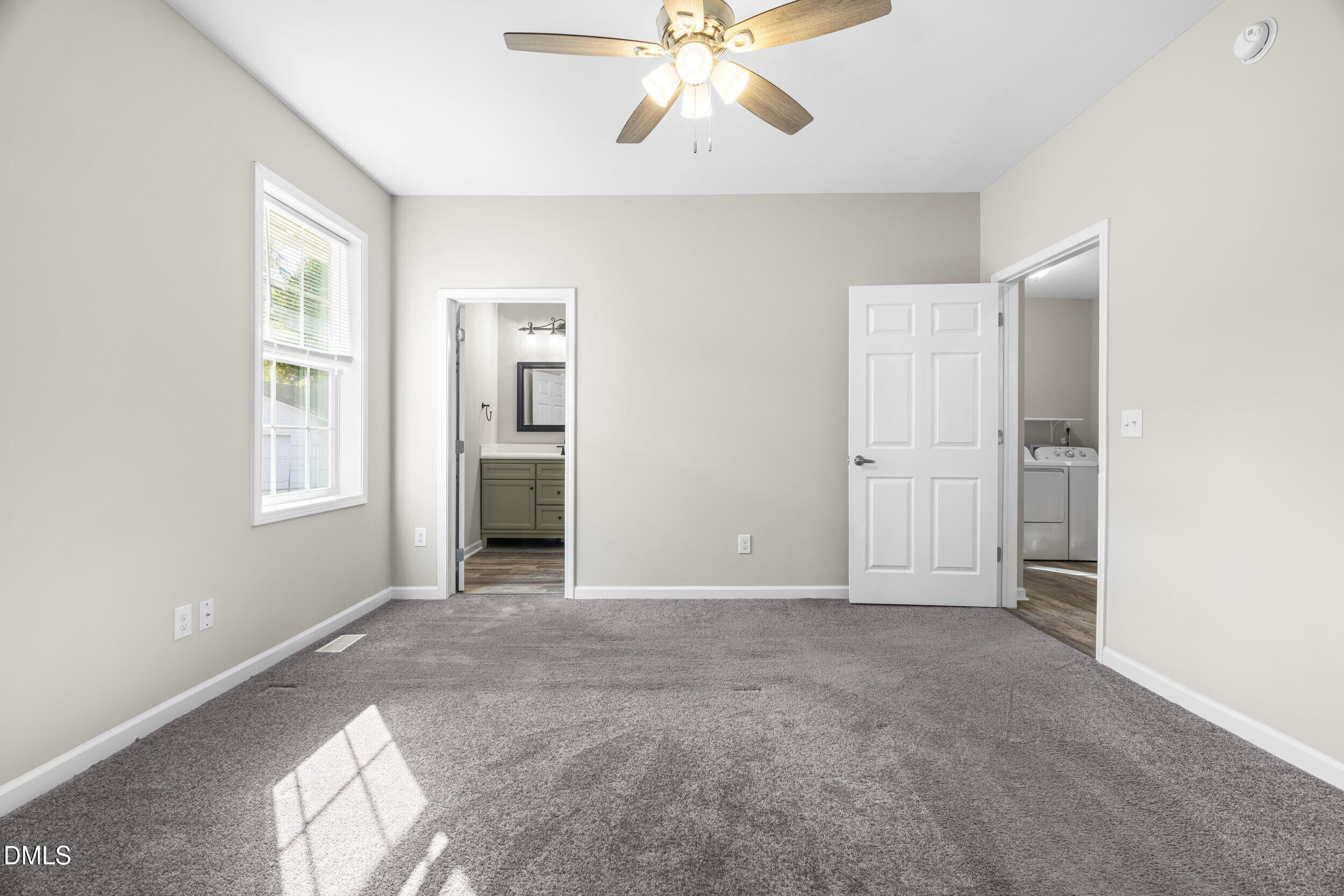 307 East J Street Erwin, NC 28339 - Photo 11 of 27 a view of an empty room with a window