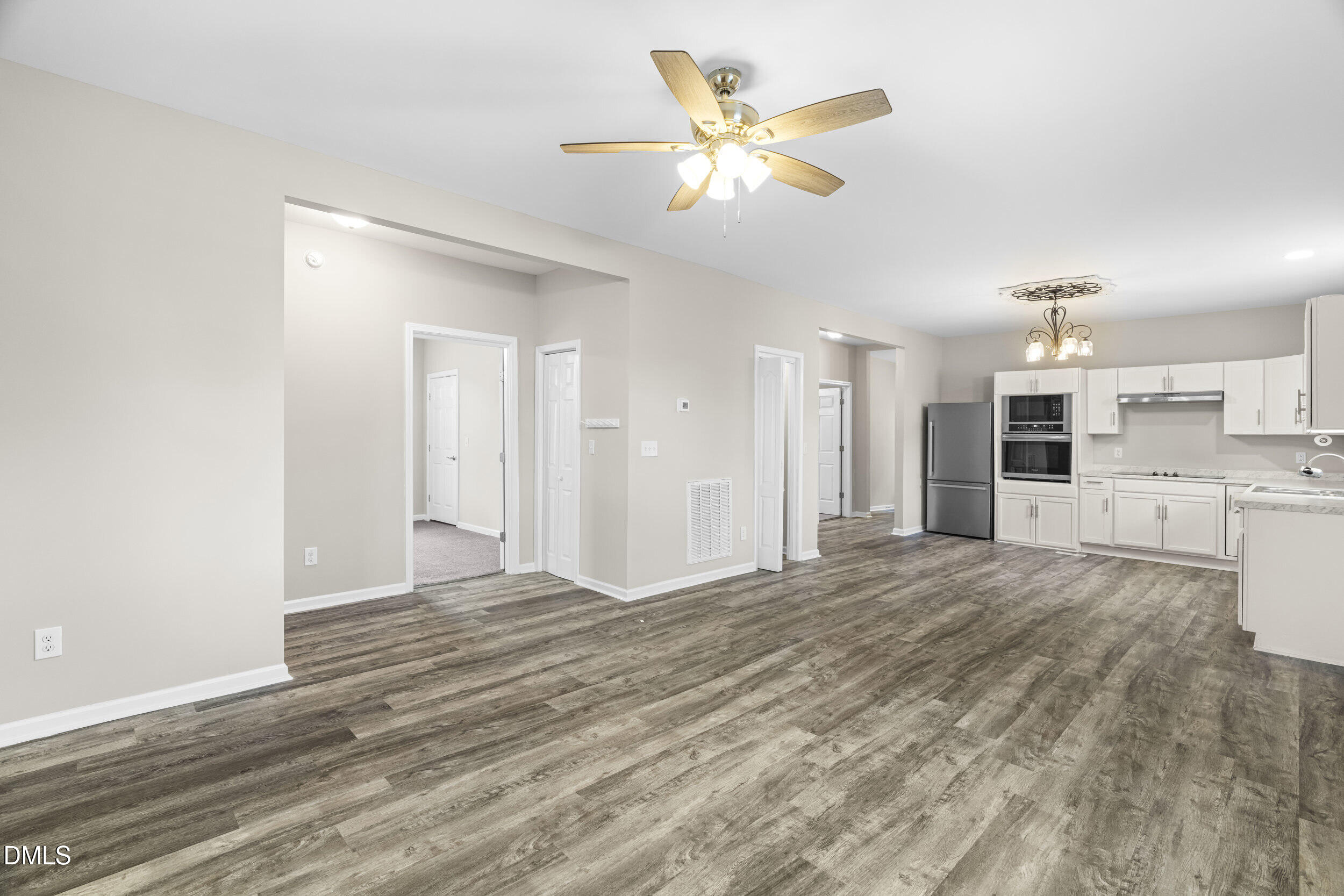 307 East J Street Erwin, NC 28339 - Photo 18 of 27 a view of a kitchen with a sink and a cabinet