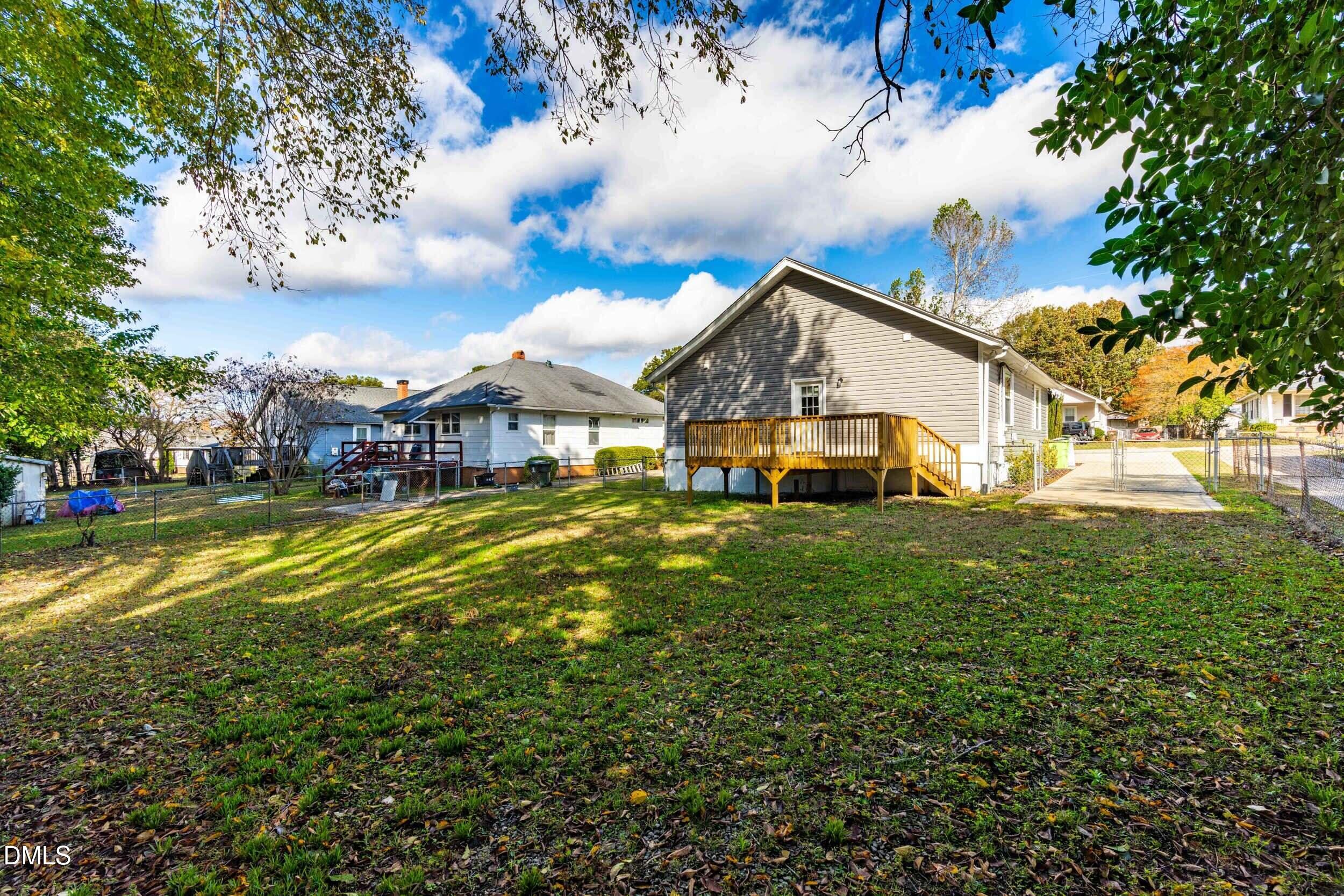 307 East J Street Erwin, NC 28339 - Photo 23 of 27 a view of a house with a big yard