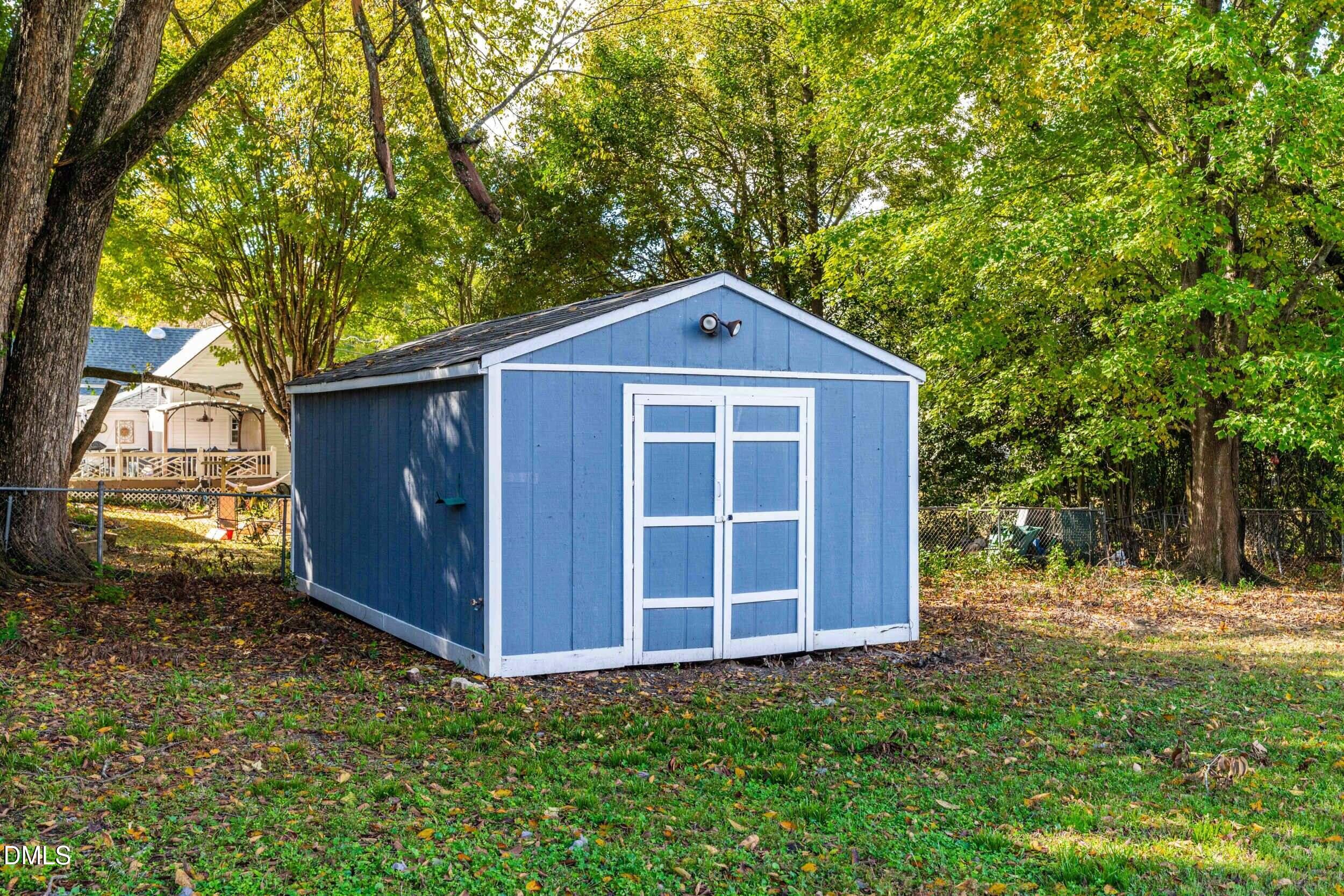 307 East J Street Erwin, NC 28339 - Photo 25 of 27 a front view of a house with a yard