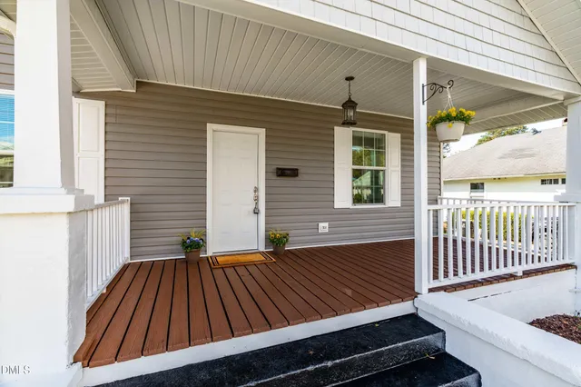 a view of outdoor space with deck and furniture