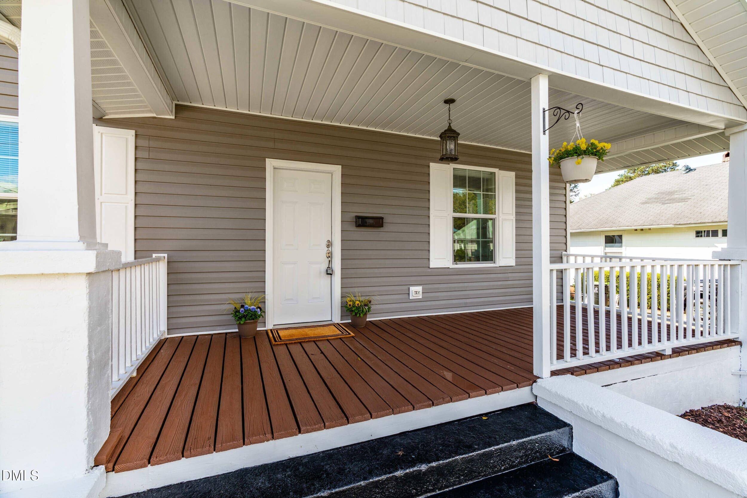 307 East J Street Erwin, NC 28339 - Photo 4 of 27 a view of outdoor space with deck and furniture