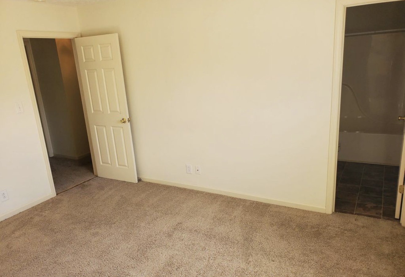 209 Ruf Drive Oak Grove, KY 42262 - Photo 6 of 7 an empty room with a door