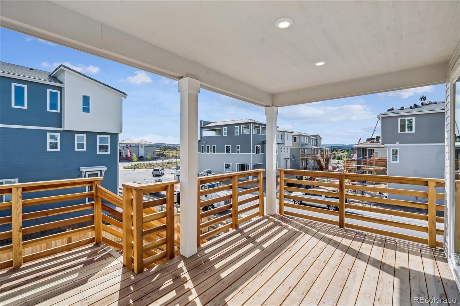 9123 White Ridge Road Englewood, CO 80112 - Photo 24 of 28 a view of living room kitchen and stainless steel appliances