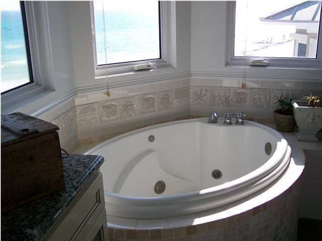 260 Wall Street Inlet Beach, FL 32461 - Photo 14 of 18 a bathroom with a sink and a window