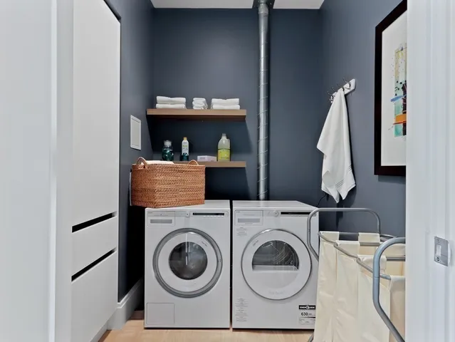 a utility room with dryer and washer