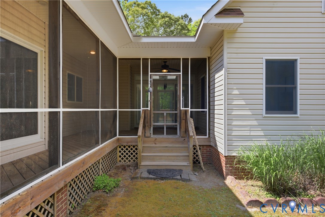 13265 Coulbourn Road Saluda, VA 23149 - Photo 47 of 62 Exterior featuring a screened porch with a ceiling