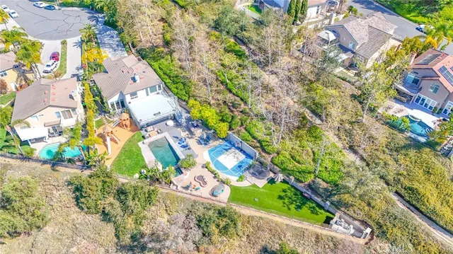 swimming pool view with a seating space