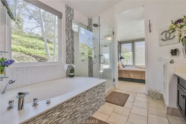 an aerial view of a house with swimming pool