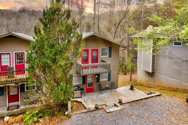 a backyard of a house with barbeque oven