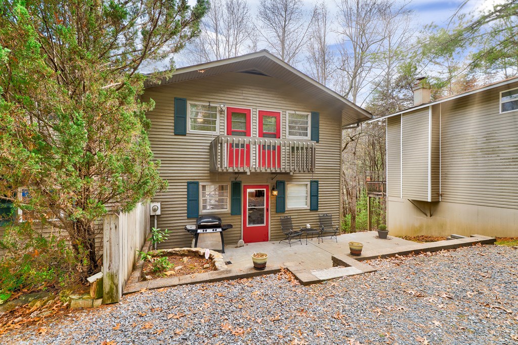 96 Clubhouse Court Ellijay, GA 30536 - Photo 19 of 56 a front view of a house with entertaining space