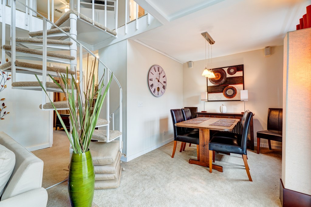 96 Clubhouse Court Ellijay, GA 30536 - Photo 32 of 56 a view of a livingroom with furniture and a potted plant