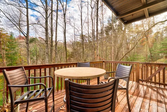 a view of balcony with furniture