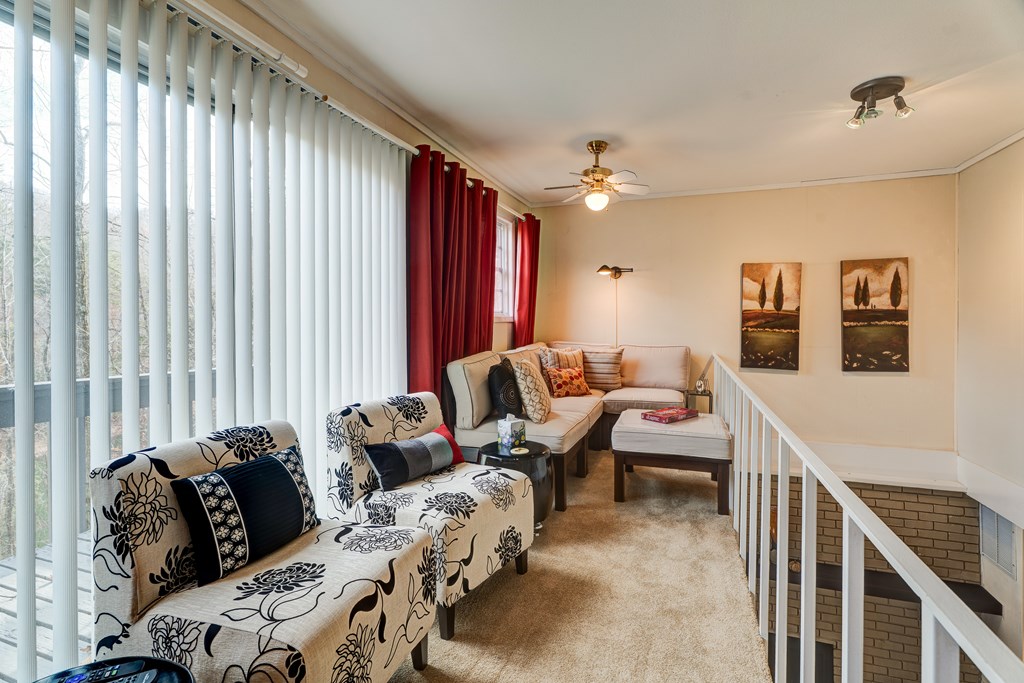 96 Clubhouse Court Ellijay, GA 30536 - Photo 42 of 56 a bedroom with furniture and a window