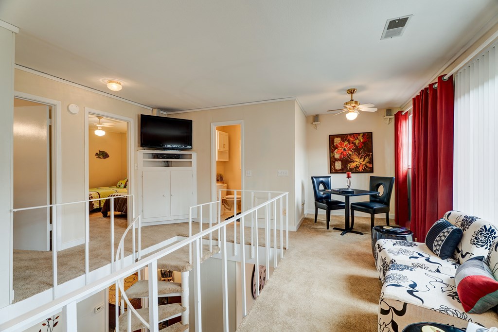 96 Clubhouse Court Ellijay, GA 30536 - Photo 44 of 56 a living room with furniture windows and a flat screen tv