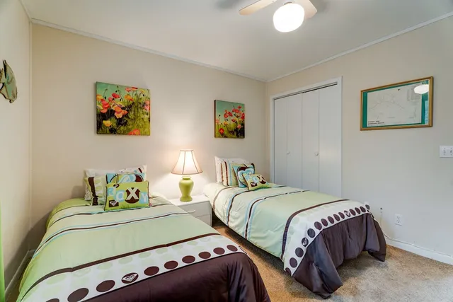 a view of lake with green space